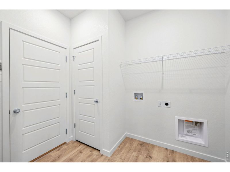 Spacious, unfurnished interior of a new home in Union Colony West, Greeley (Image 9).