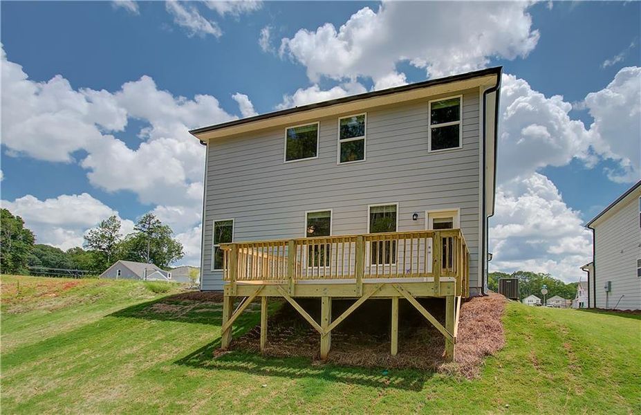 Front exterior of a new home in Enclave at Evergreen, Fairburn, GA, highlighting curb appeal (Image 14).