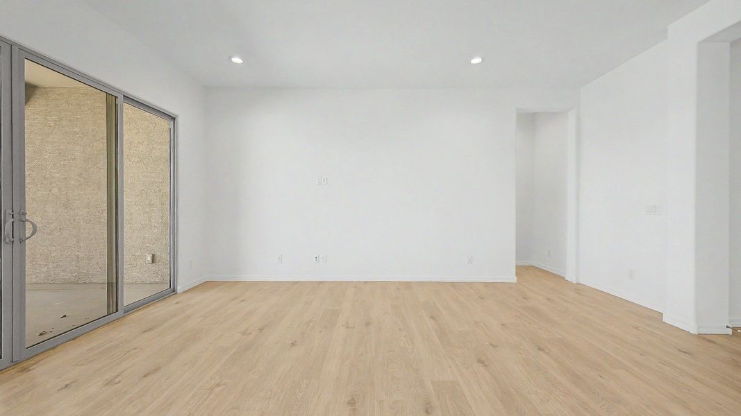 Furnished interior view inside a new home in Windrose, Waddell (Image 10).