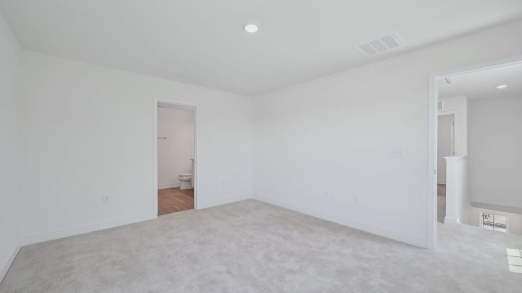 Furnished interior view inside a new home in Sidney Creek Single Family, Zebulon (Image 14).
