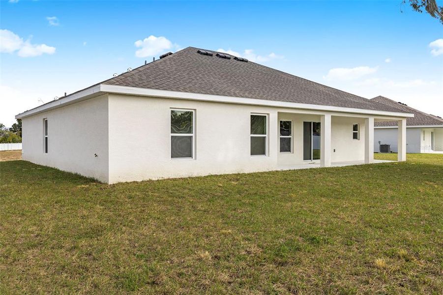 Exterior details and patio area of a home in Sable Run, Ocala (Image 8).
