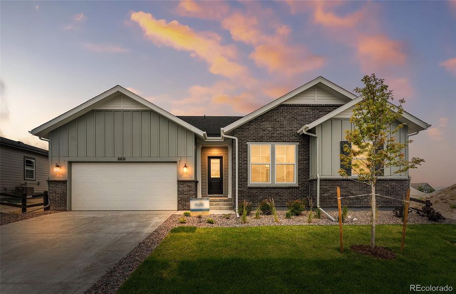 Front exterior of a new home in Hilltop at Inspiration, Aurora, CO, highlighting curb appeal (Image 30).