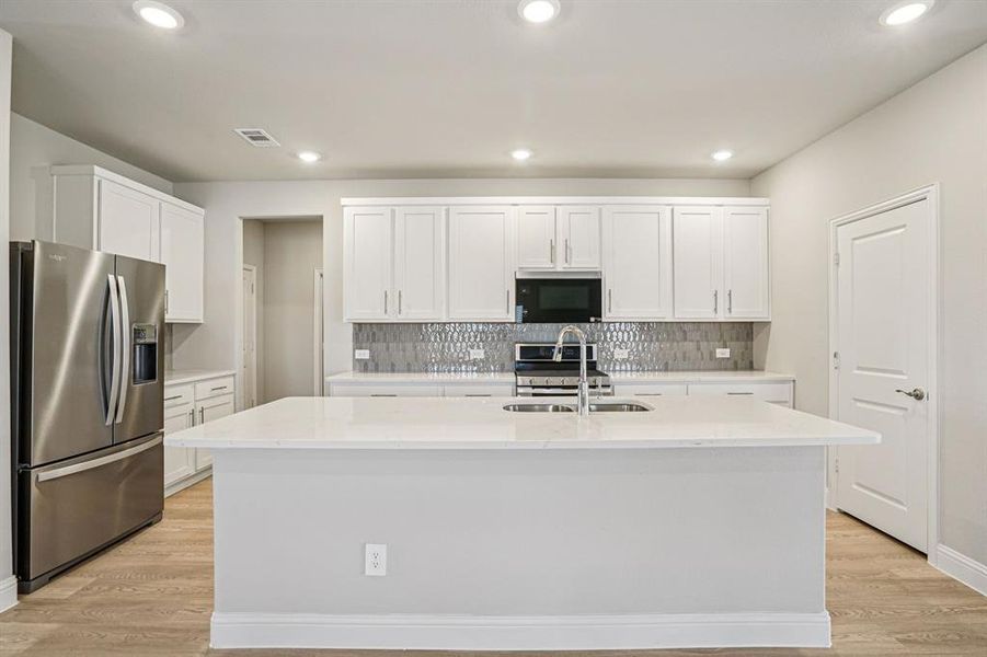 Photo is not of the actual home, but is an inspirational photo of builder’s model home and may depict options, furnishings, and/or decorator features that are not included.