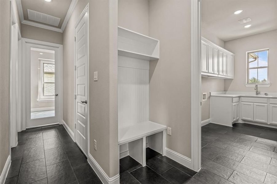 Mudroom featuring plenty of natural light and recessed lighting Mudroom featuring plenty of natural light and recessed lighting
