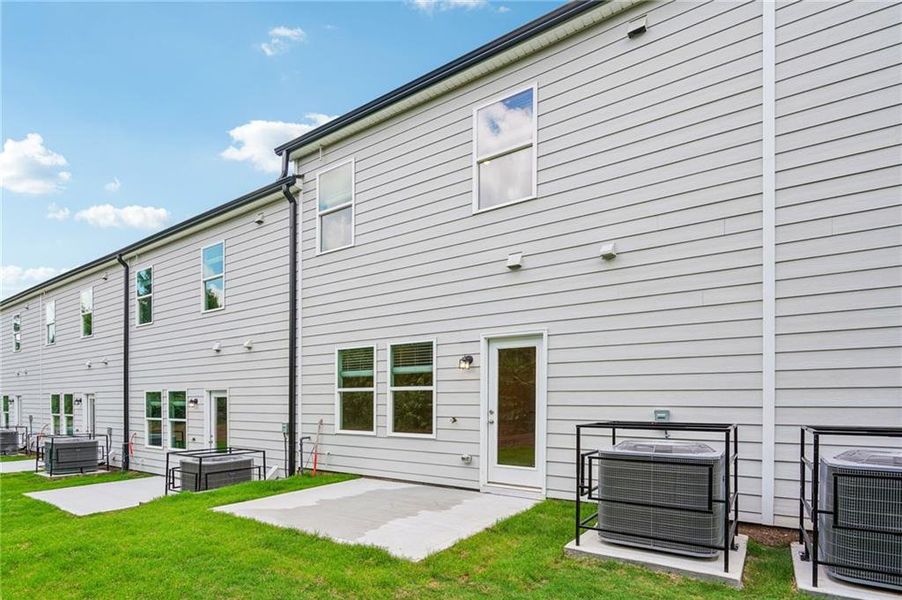 Exterior details and patio area of a home in Artisan Walk, Fairburn (Image 23).