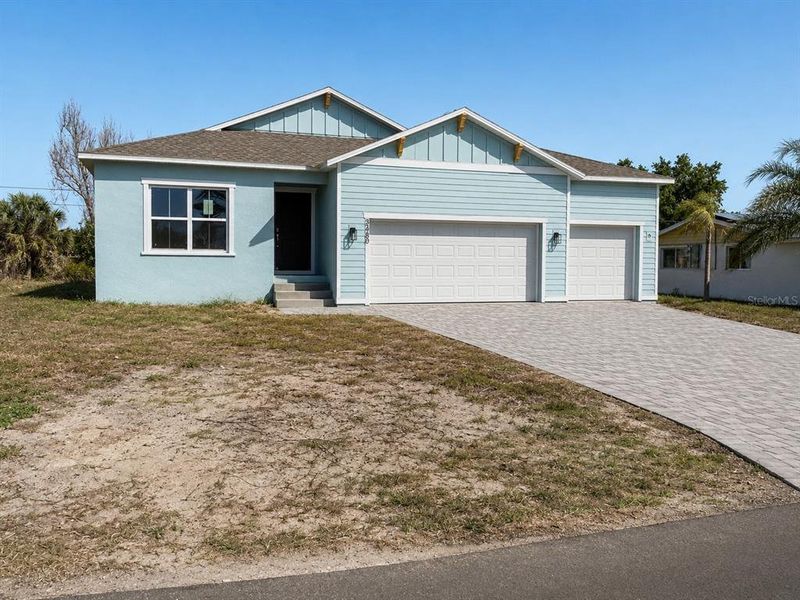 Front exterior of a new home in , Rotonda West, FL, highlighting curb appeal (Image 1). Front exterior of a new home in , Rotonda West, FL, highlighting curb appeal (Image 1).