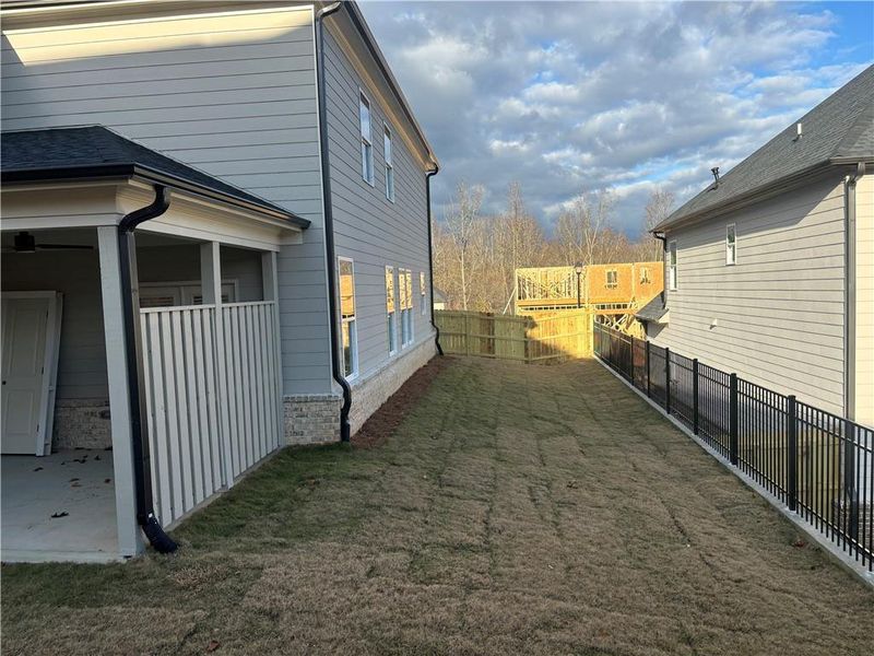 Exterior details and patio area of a home in , Buford (Image 3). Exterior details and patio area of a home in , Buford (Image 3).