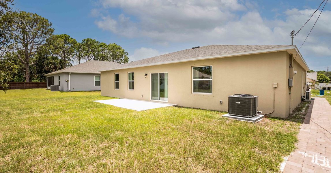 Exterior details and patio area of a home in Palm Bay, Palm Bay (Image 4).