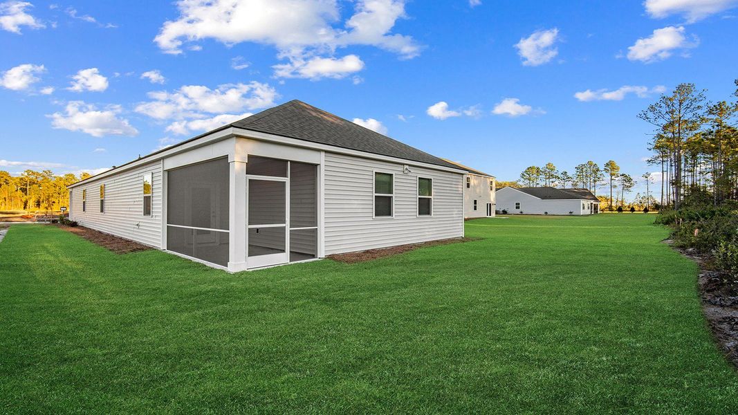 Exterior details and patio area of a home in The Lakes at North Glynn, Brunswick (Image 3).