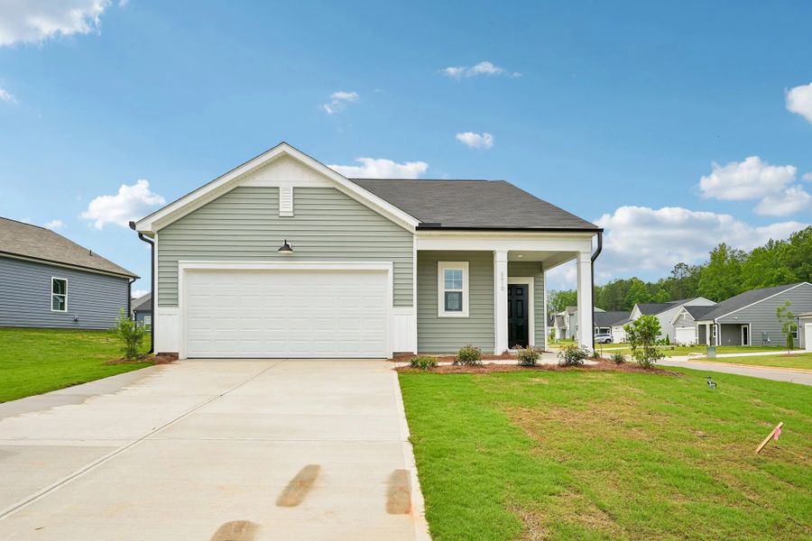Front exterior of a new home in Middleton Farms, Middlesex, NC, highlighting curb appeal (Image 1). Front exterior of a new home in Middleton Farms, Middlesex, NC, highlighting curb appeal (Image 1).