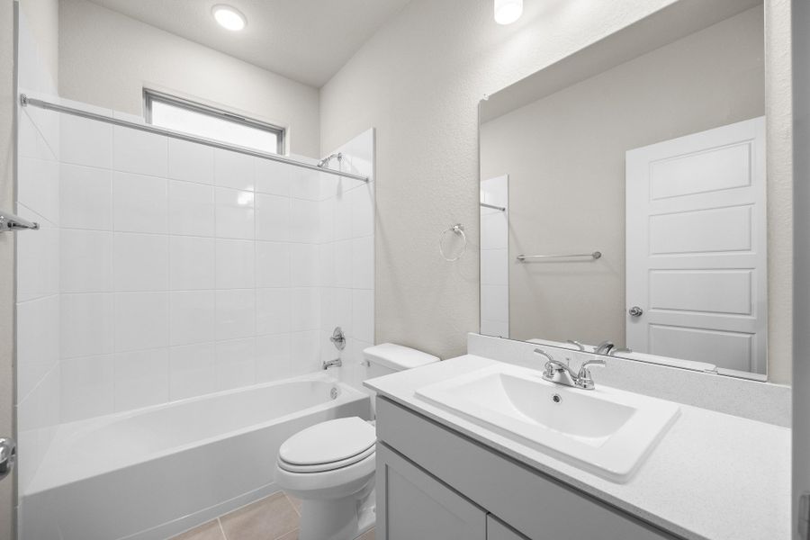 Bathroom in the Elm home plan by Trophy Signature Homes – REPRESENTATIVE PHOTO Bathroom in the Elm home plan by Trophy Signature Homes – REPRESENTATIVE PHOTO