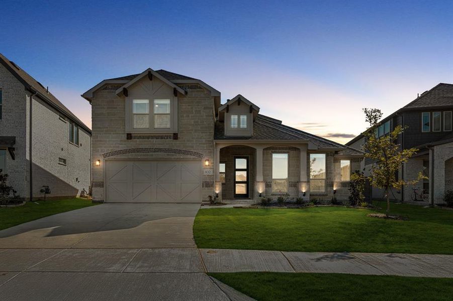 Front exterior of a new home in Union Park Classic 55, Little Elm, TX, highlighting curb appeal (Image 2).