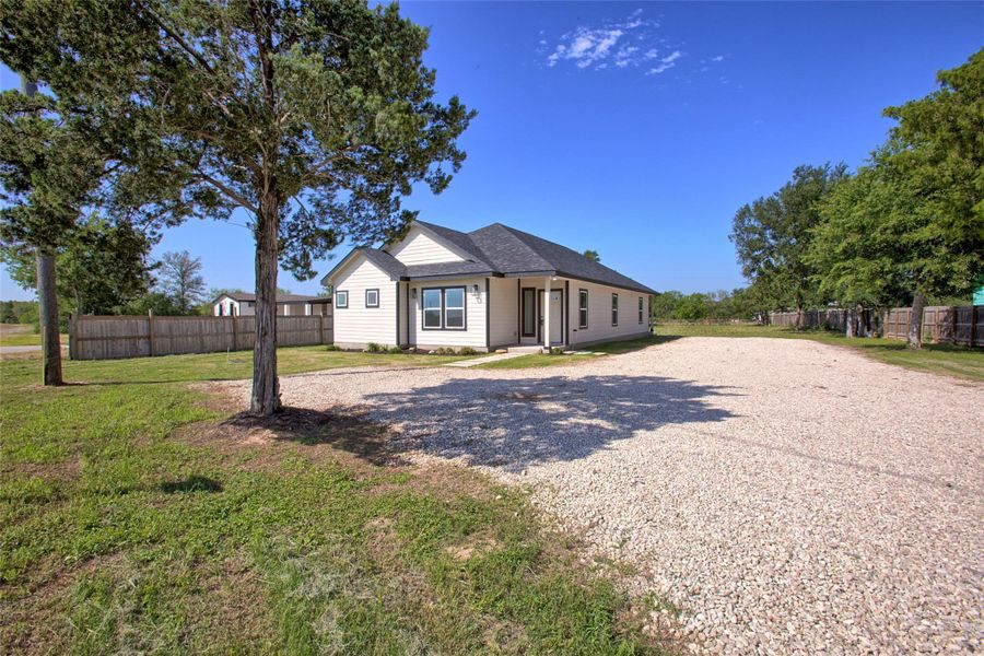 Front exterior of a new home in , Bastrop, TX, highlighting curb appeal (Image 1). Front exterior of a new home in , Bastrop, TX, highlighting curb appeal (Image 1).