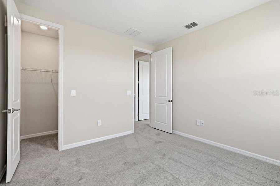 Spacious, unfurnished interior of a new home in Indigo Creek, Apollo Beach (Image 24).