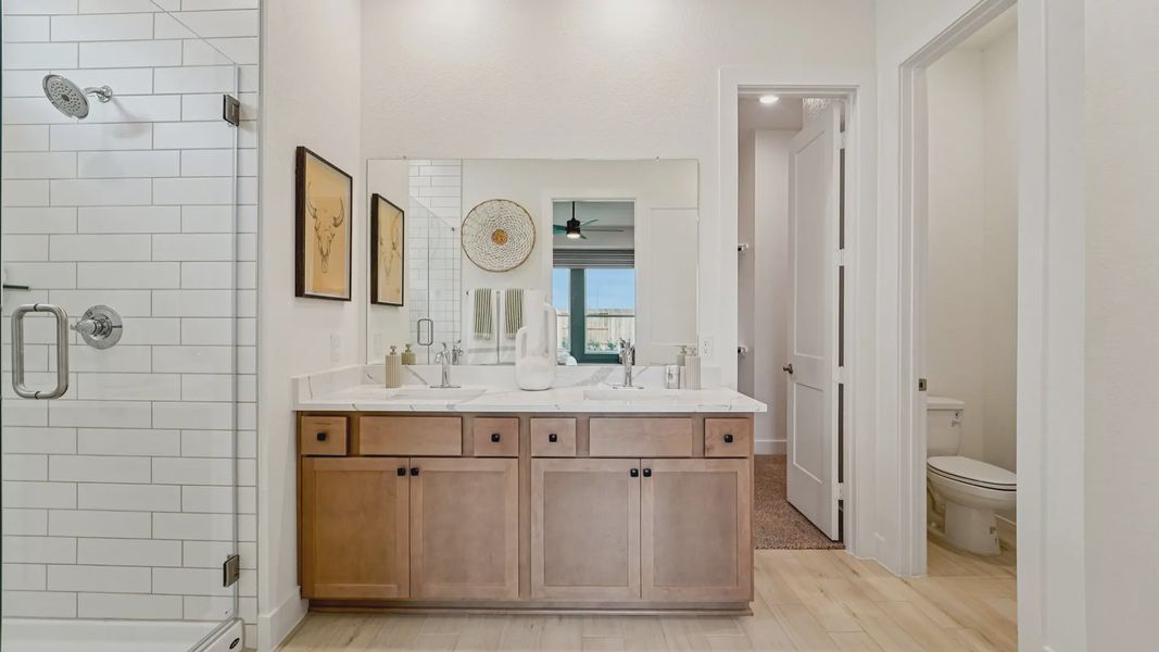 Representative furnished interior of a home built from the Laramie by Chesmar Homes in Wildrye 45', Waller (Image 24). Representative furnished interior of a home built from the Laramie by Chesmar Homes in Wildrye 45', Waller (Image 24).