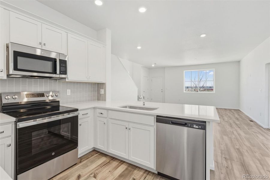 Furnished interior view inside a new home in Windler, Aurora (Image 6).