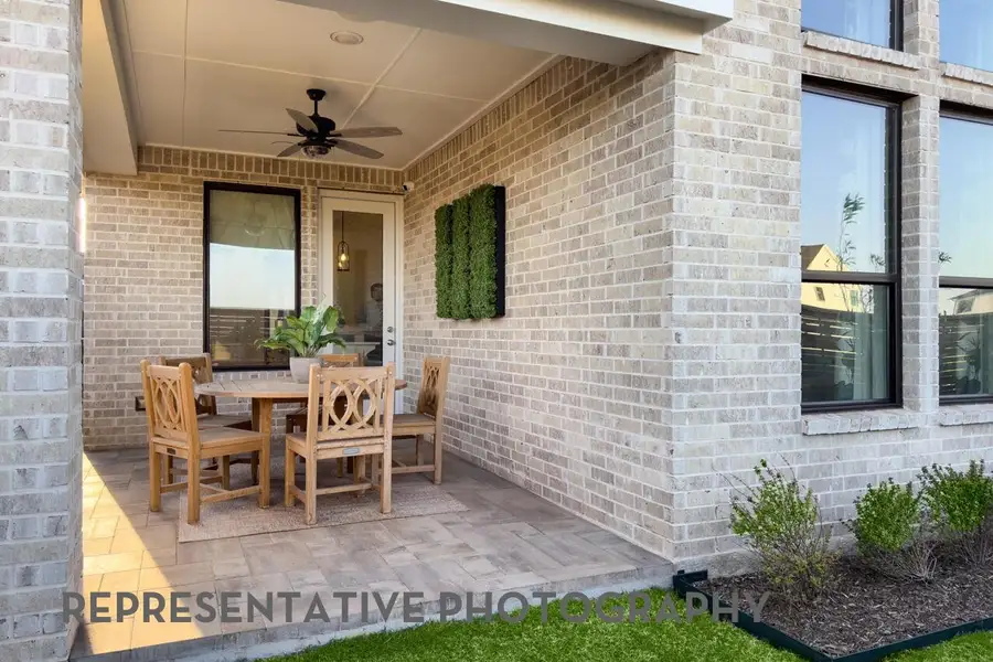 Exterior details and patio area of a home in ARTAVIA, Conroe (Image 2).