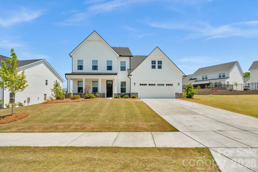 Front exterior of a new home in , Fort Mill, SC, highlighting curb appeal (Image 21).