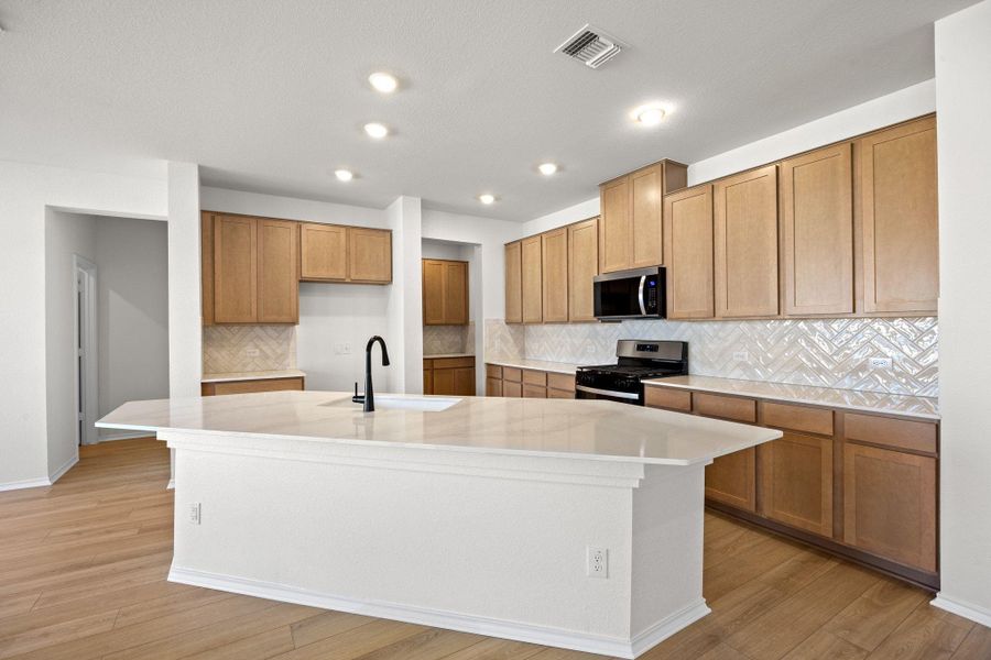 Furnished interior view inside a new home in Salerno - Classic Collection, Round Rock (Image 14).