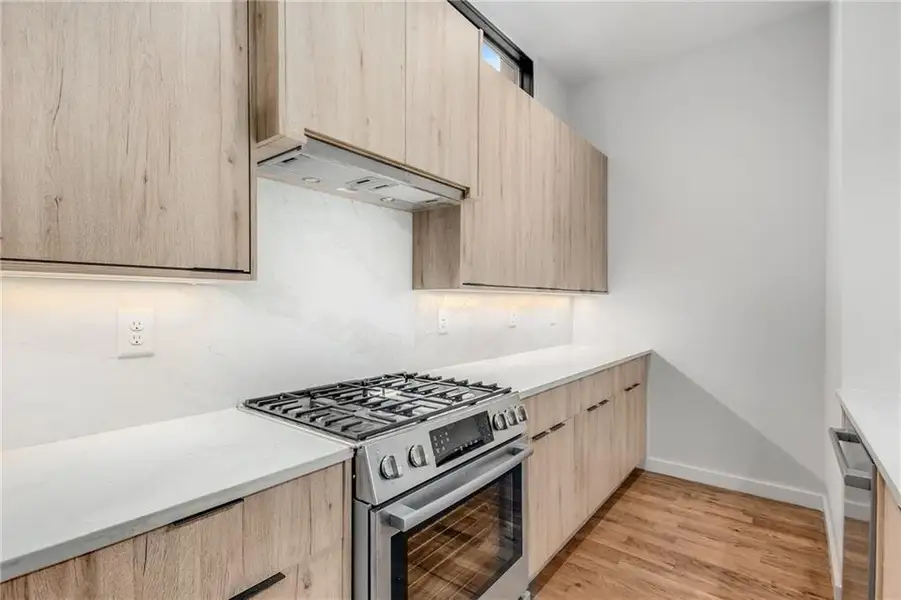 Furnished interior view inside a new home in Ten 5 Summerhill, Atlanta (Image 6).