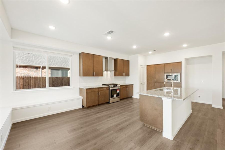 Furnished interior view inside a new home in East Oak Creek Elements, Commerce (Image 9).
