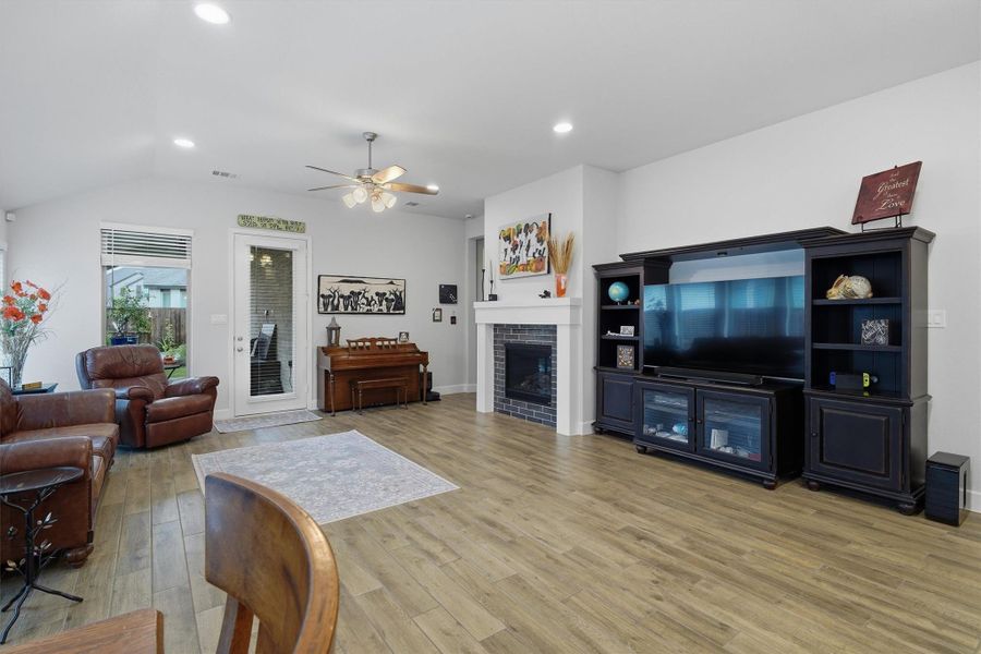 Large living room space, tile flooring and recessed lighting Large living room space, tile flooring and recessed lighting