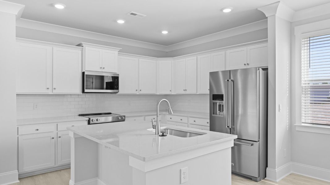Representative furnished interior of a home built from the SPRUCEWOOD by D.R. Horton in Sheep Island, Summerville (Image 5).