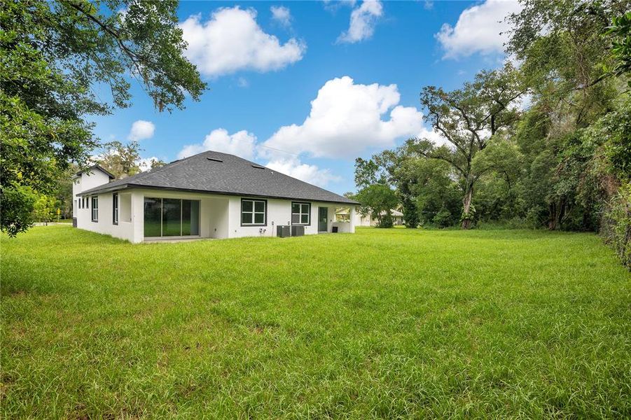 Front exterior of a new home in , Apopka, FL, highlighting curb appeal (Image 35).