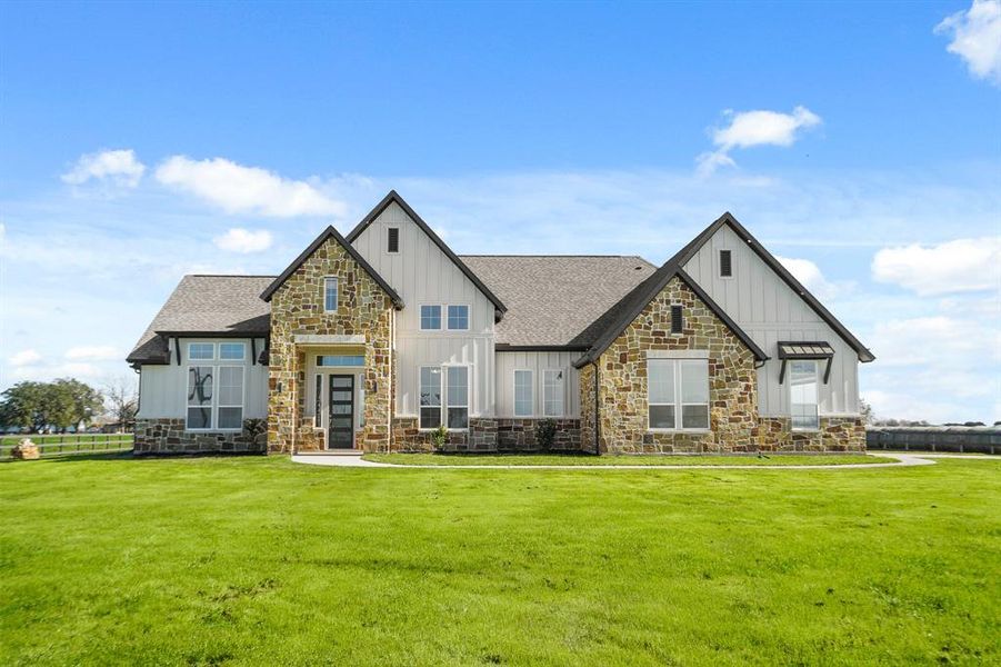 Want all the perks of a brand-new home but don’t want the hassle of building? Take advantage of this rare find! This custom, single-story home, finished in siding and stacked stone, sits on 2 sprawling acres in the desirable, unrestricted section of East Benard.