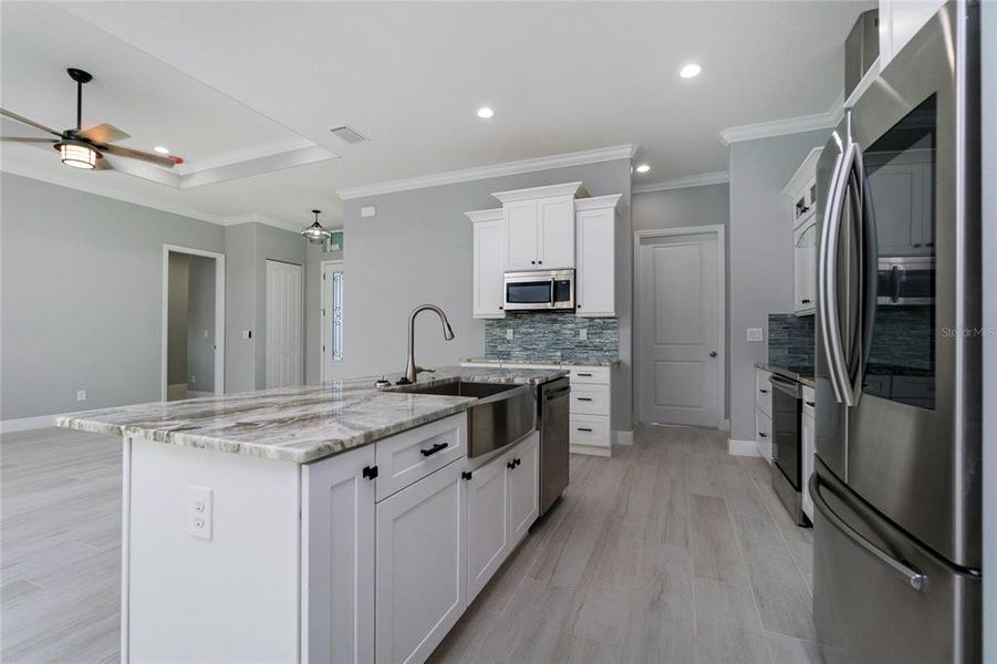 Furnished interior view inside a new home in , Port Charlotte (Image 12).