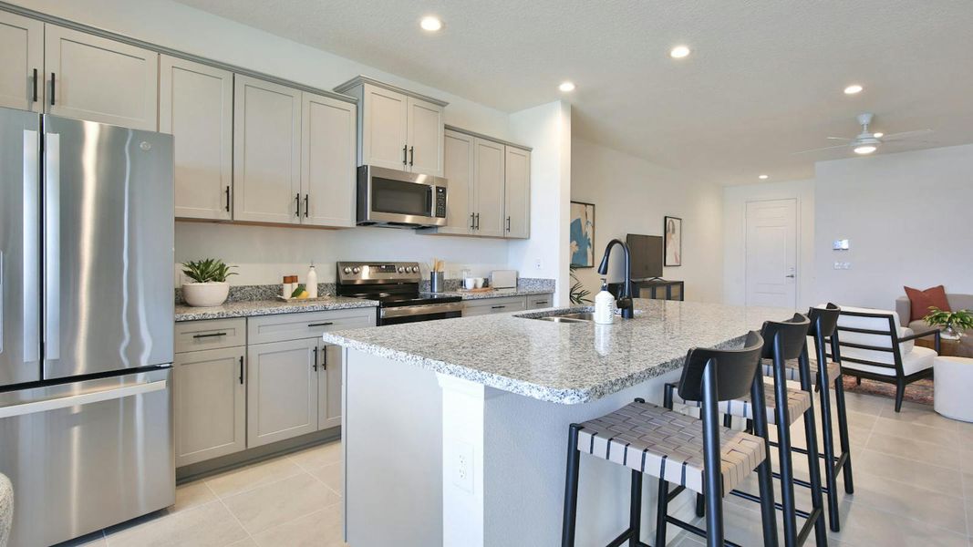 Furnished interior view inside a new home in Palm Grove Real Estate and Homes for Sale in Lakewood Ranch, FL - Neal Communities, Lakewood Ranch (Image 28).