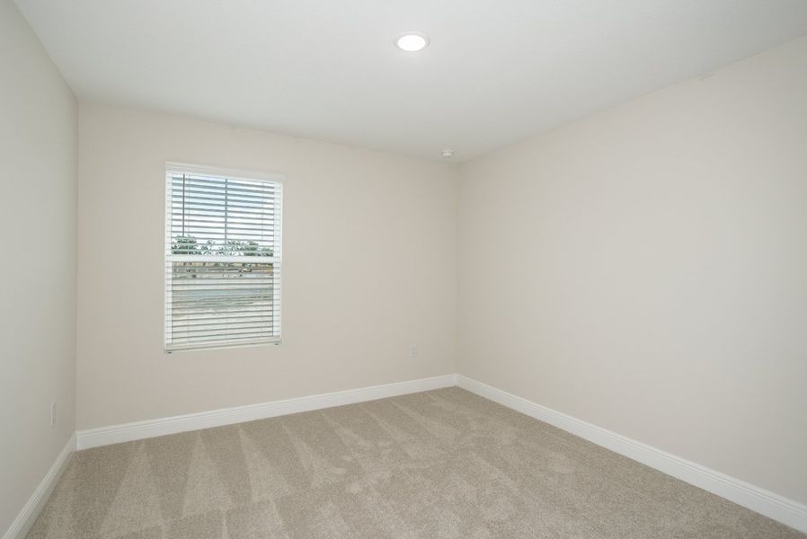 Spacious, unfurnished interior of a new home in Pasadena Woods, Dade City (Image 24).
