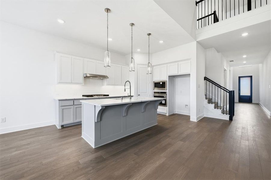 Furnished interior view inside a new home in Wildridge, Oak Point (Image 13).