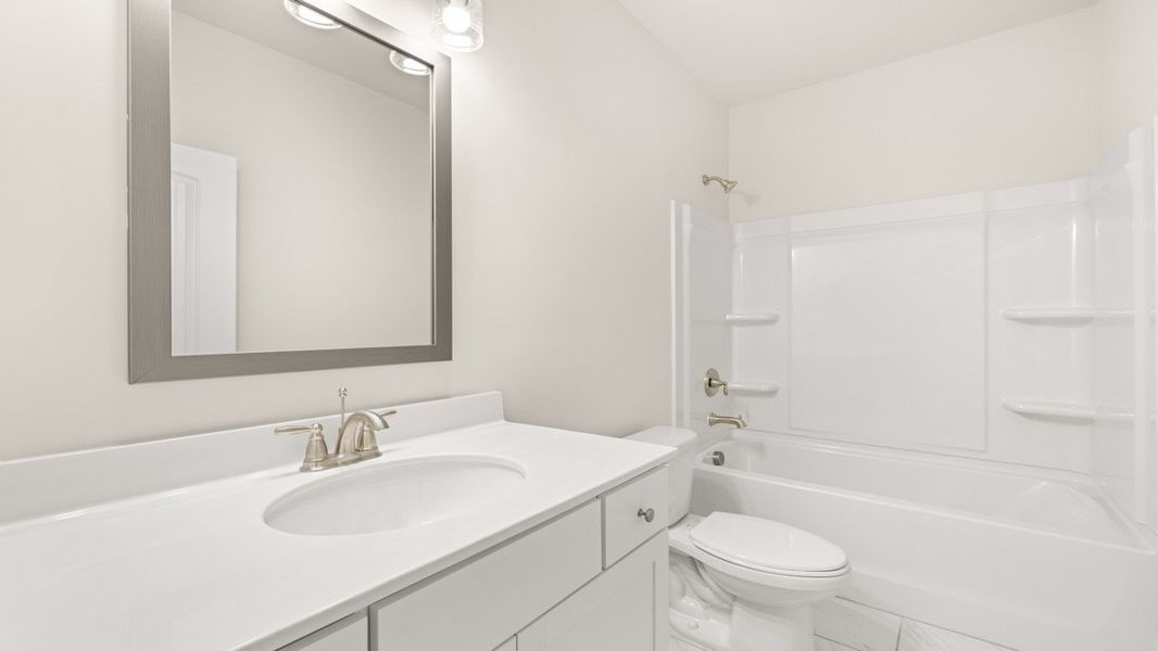 Representative furnished interior of a home built from the GRAYSON by D.R. Horton in Butner Estates, South Fulton (Image 10).