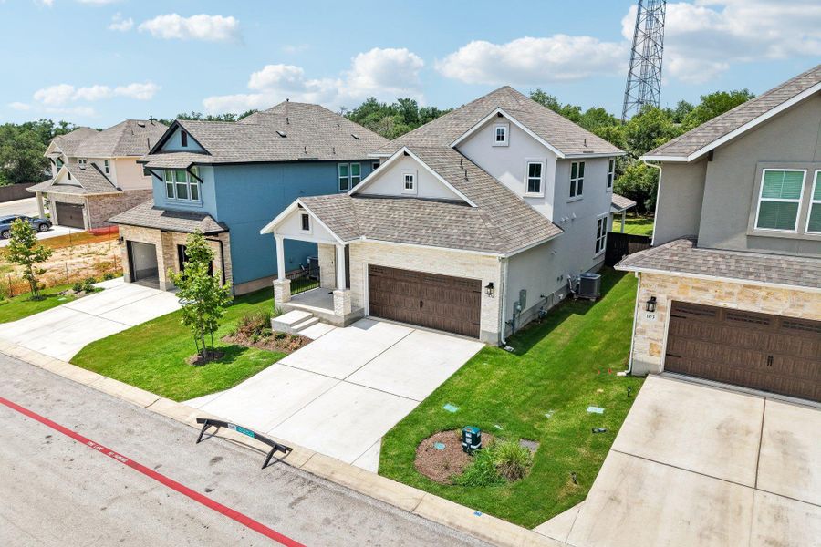 Front exterior of a new home in Clear Creek, Round Rock, TX, highlighting curb appeal (Image 26).