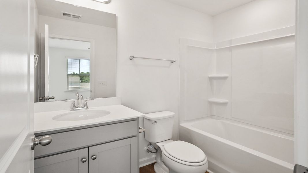 Furnished interior view inside a new home in Clear Springs Townhomes, North Charleston (Image 15).