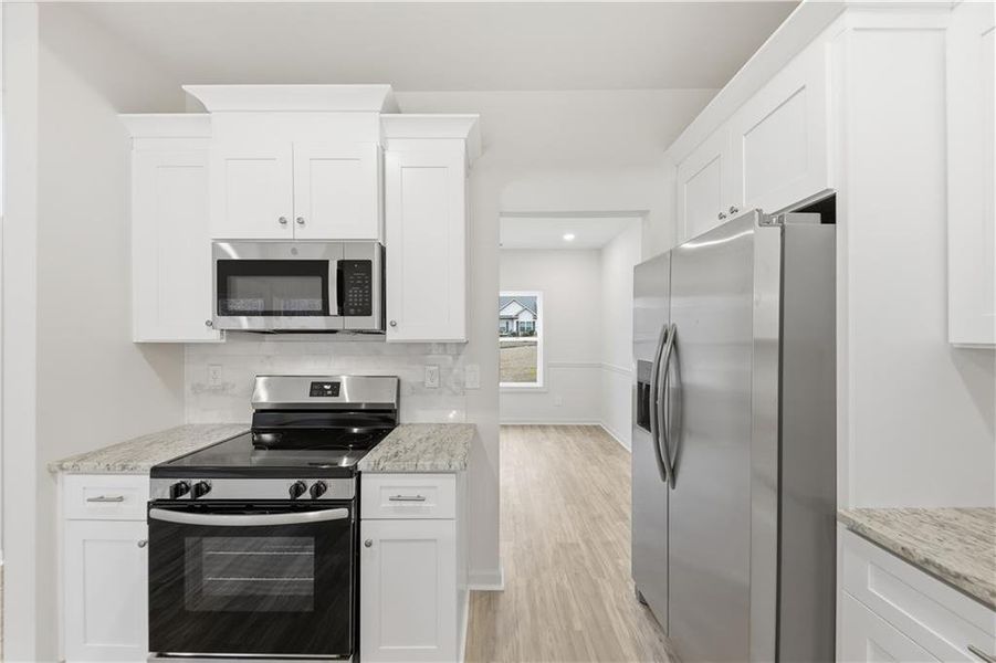 Furnished interior view inside a new home in , Whitesburg (Image 6).