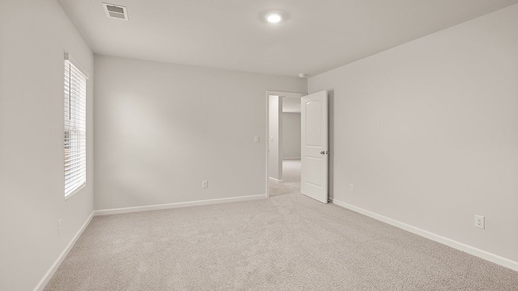 Representative unfurnished interior of a home built from the Mansfield by D.R. Horton in Northwoods at Mirror Lake, Villa Rica (Image 37).