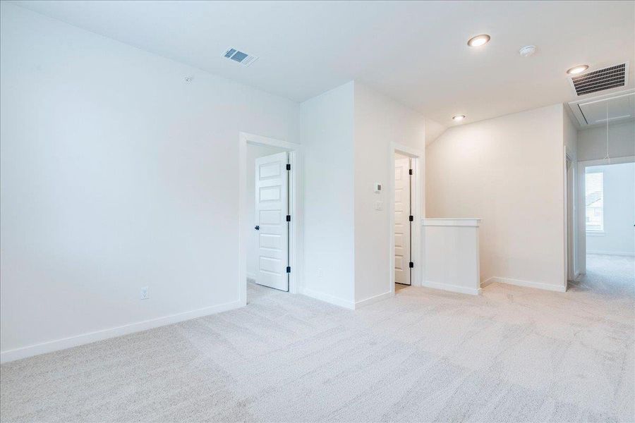 A versatile bonus space features soft carpeting and multiple access points.