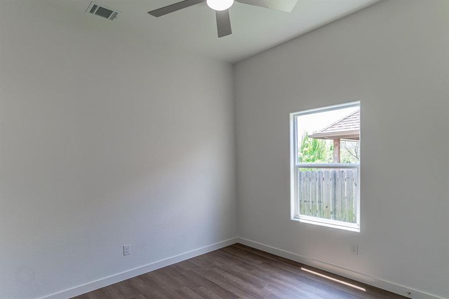 Bedroom with vinyl flooring