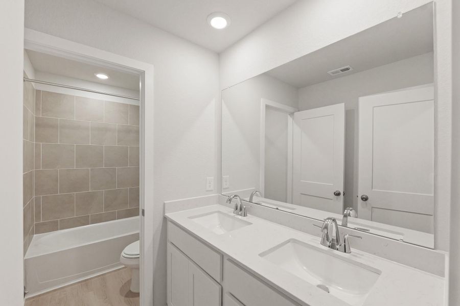 Furnished interior view inside a new home in Northpark South, Porter (Image 7).