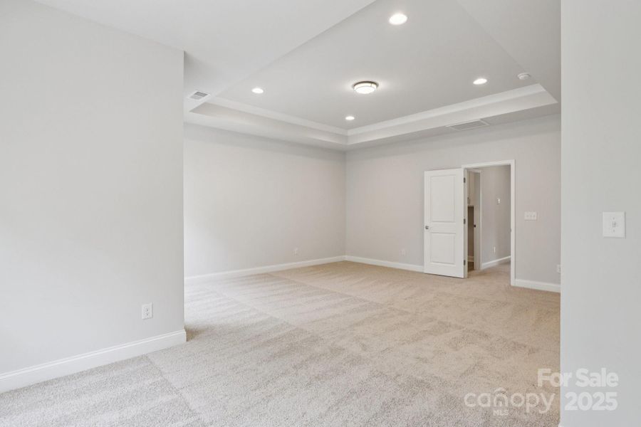 Spacious, unfurnished interior of a new home in Walk23, Huntersville (Image 23).