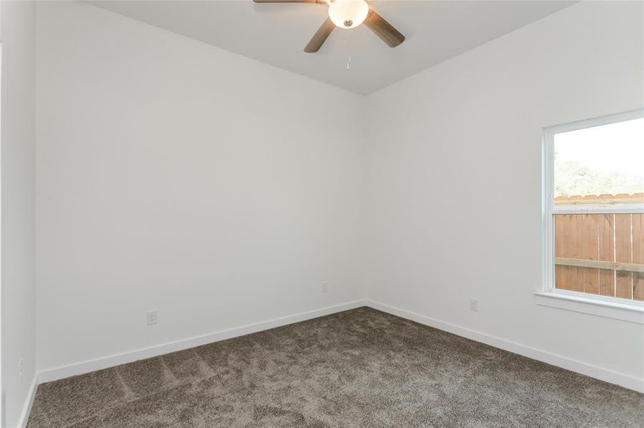 Empty room featuring carpet floors