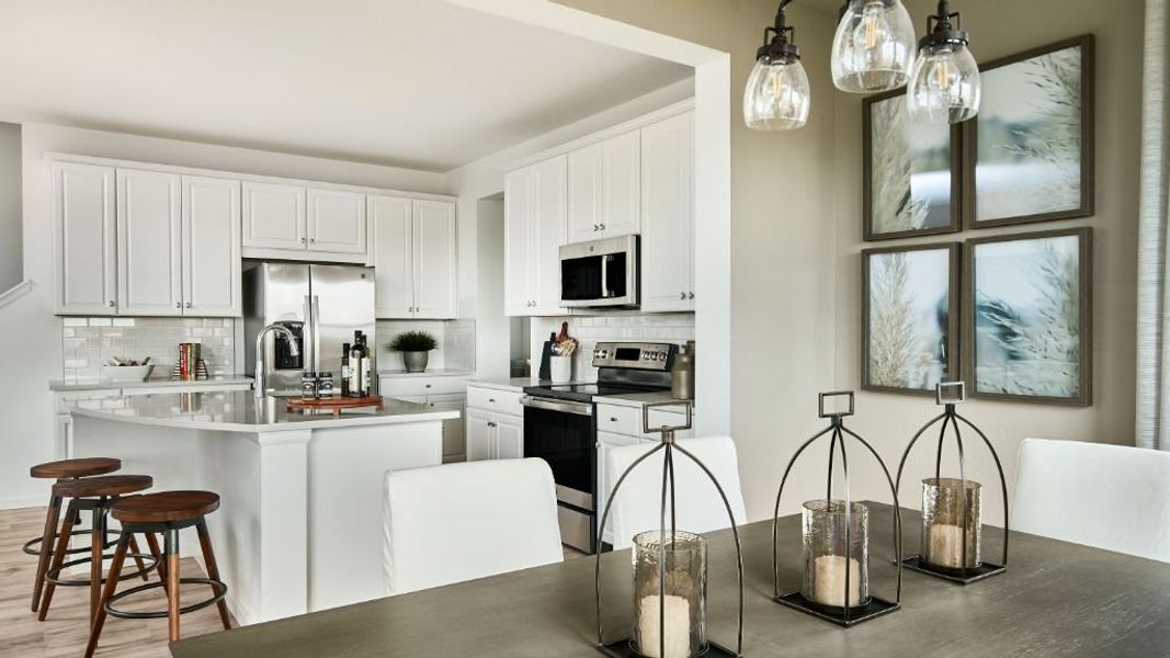 Furnished interior view inside a new home in The Aurora Highlands, Aurora (Image 8).