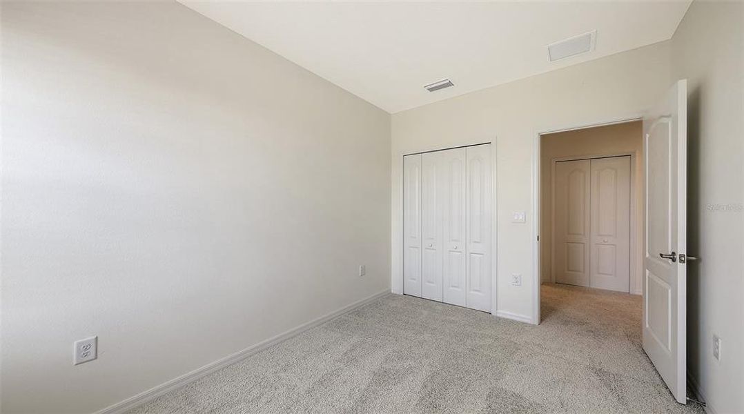 Spacious, unfurnished interior of a new home in Palm Grove, Bradenton (Image 19).