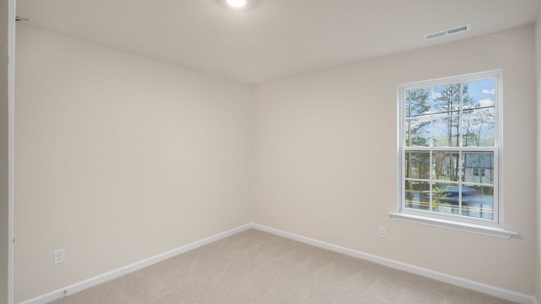 Spacious, unfurnished interior of a new home in Hobbs Farm, Ayden (Image 28).