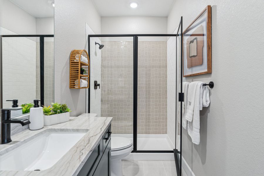 Furnished interior view inside a new home in Trailstone, Arvada (Image 50).
