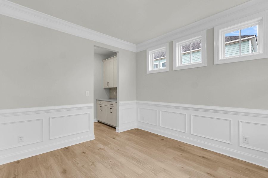 Spacious, unfurnished interior of a new home in Tidewater at Lakes of Cane Bay, Summerville (Image 19).