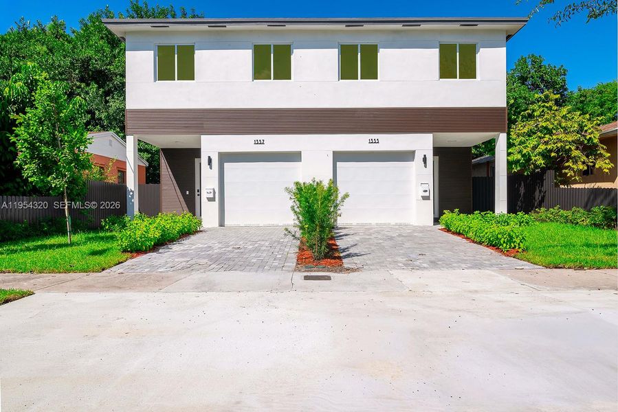 Front exterior of a new home in , Miami, FL, highlighting curb appeal (Image 21). Front exterior of a new home in , Miami, FL, highlighting curb appeal (Image 21).