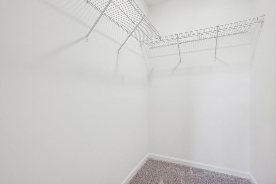 Representative unfurnished interior of a home built from the Dahlia by Starlight Homes in Walker Station, Wilson (Image 24).